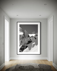 Tantalus 4 print framed on a wall in a white room