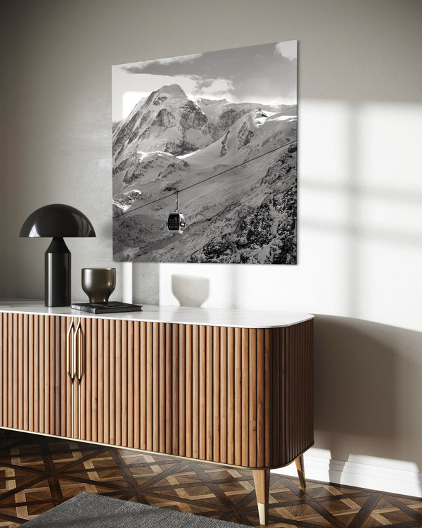 Matterhorn Express print framed above a slatted wood sideboard