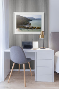 Howe Sound Passage framed print above a white desk in a home office