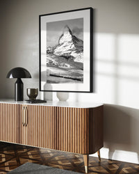 Matterhorn and the Gornergrat print framed above a slatted wood sideboard