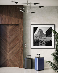 Zermatt Village print framed in an entrance hall beside a doorway